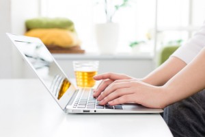 a young woman using laptop computer